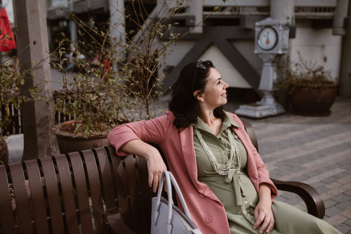 woman sitting on bench